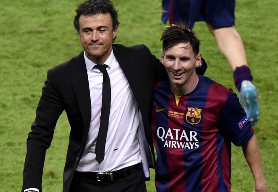 Barcelona's coach Luis Enrique and Barcelona's Argentinian forward Lionel Messi (R) celebrate after winning the UEFA Champions League Final football match between Juventus and FC Barcelona at the Olympic Stadium in Berlin on June 6, 2015. AFP PHOTO / ODD ANDERSEN (Photo credit should read ODD ANDERSEN/AFP/Getty Images)