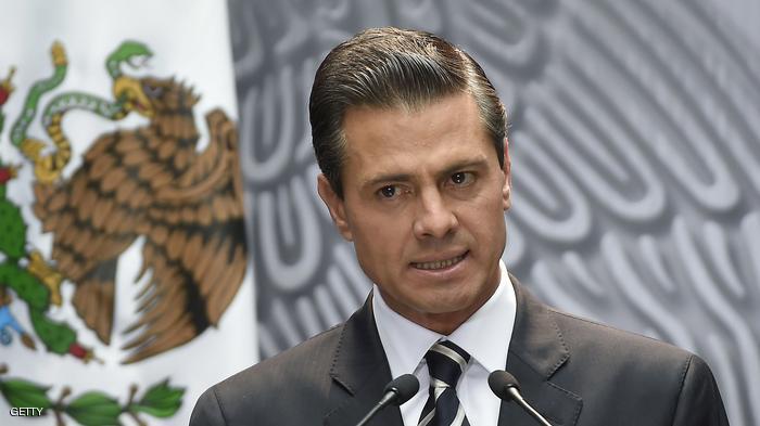 Mexican President Enrique Pena Nieto delivers a speech at the National Palace, in Mexico City, on October 6, 2014. ena Nieto vowed Monday that authorities would go after those behind the disappearance of 43 students amid fears several of them were among bodies in a mass grave.AFP PHOTO/RONALDO SCHEMIDT (Photo credit should read RONALDO SCHEMIDT/AFP/Getty Images)