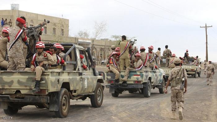 Soldiers loyal to Yemen's President Abd-Rabbu Mansour Hadi ride at the back of a pick-up truck during a parade in Marib province, east of the capital, Sanaa, on May 25, 2015. Rebel forces and loyalist fighters were locked in fierce fighting in Yemen as hopes of a political solution faded after the United Nations postponed peace talks. AFP PHOTO / STR (Photo credit should read STR/AFP/Getty Images)