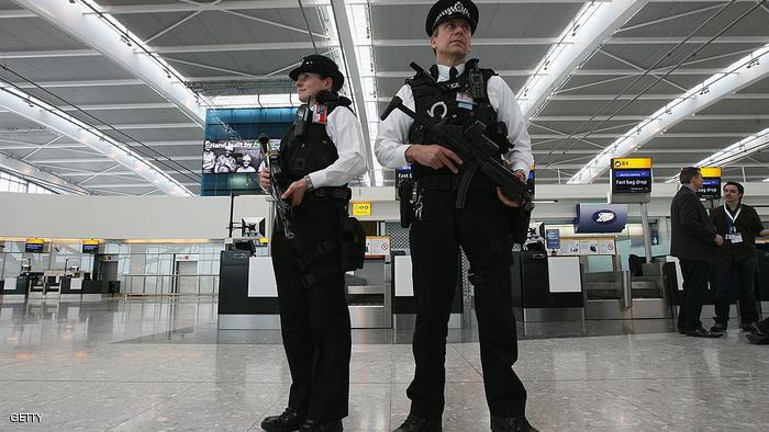 LONDON - MARCH 13: Armed police officers patrol the new Terminal 5 at Heathrow Airport prior to its official opening on March 14, 2008 in London, England. (Photo by Dan Kitwood/Getty Images)