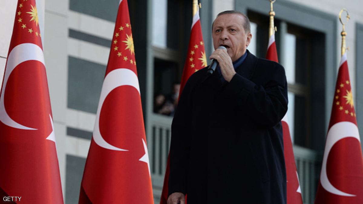 ANKARA, TURKEY - APRIL 17: Turkish President Tayyip Erdogan gives a referendum victory speech to his supporters at the Presidential Palace on April 17, 2017 in Ankara Turkey. Erdogan declared victory in Sunday's historic referendum that will grant sweeping powers to the presidency, hailing the result as a "historic decision. 51.4 per cent per cent of voters had sided with the "Yes" campaign, ushering in the most radical change to the country's political system in modern times.Turkey's main opposition calls on top election board to annul the referendum. OSCE observers said that a Turkish electoral board decision to allow as valid ballots that did not bear official stamps undermined important safeguards against fraud. (Photo by Gokhan Sahin/Getty Images)