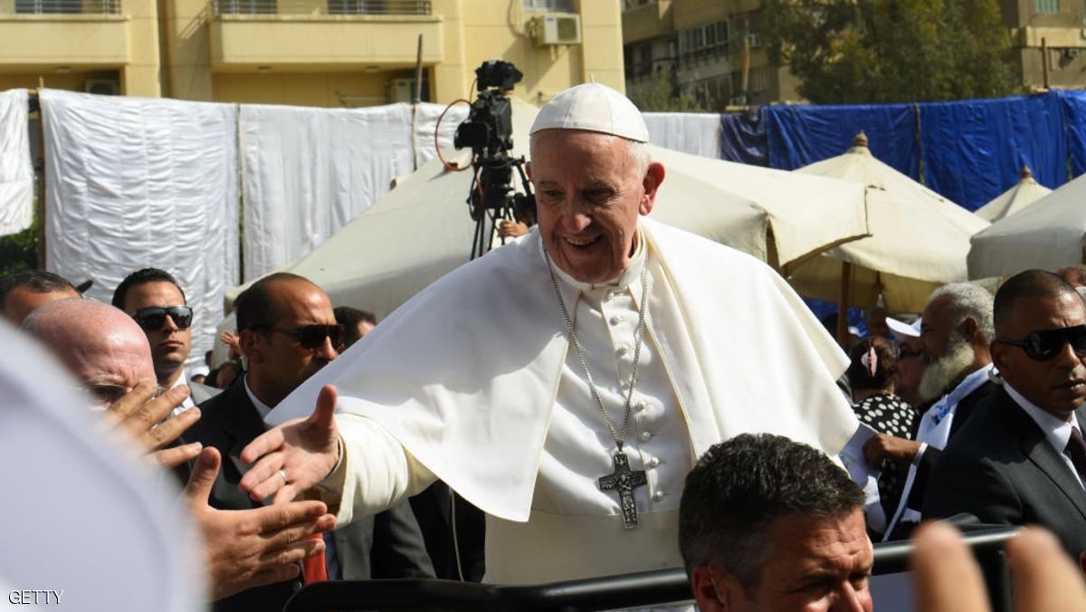 Pope Francis greets worshippers outside the Coptic Catholic College of Theology and Humanities in the southern Cairo suburb of Maadi, on April 29, 2017.
Pope Francis led a jubilant mass for thousands of Egyptian Catholics during a visit to support the country's embattled Christian minority and promote dialogue with Muslims. / AFP PHOTO / MOHAMED EL-SHAHED (Photo credit should read MOHAMED EL-SHAHED/AFP/Getty Images)