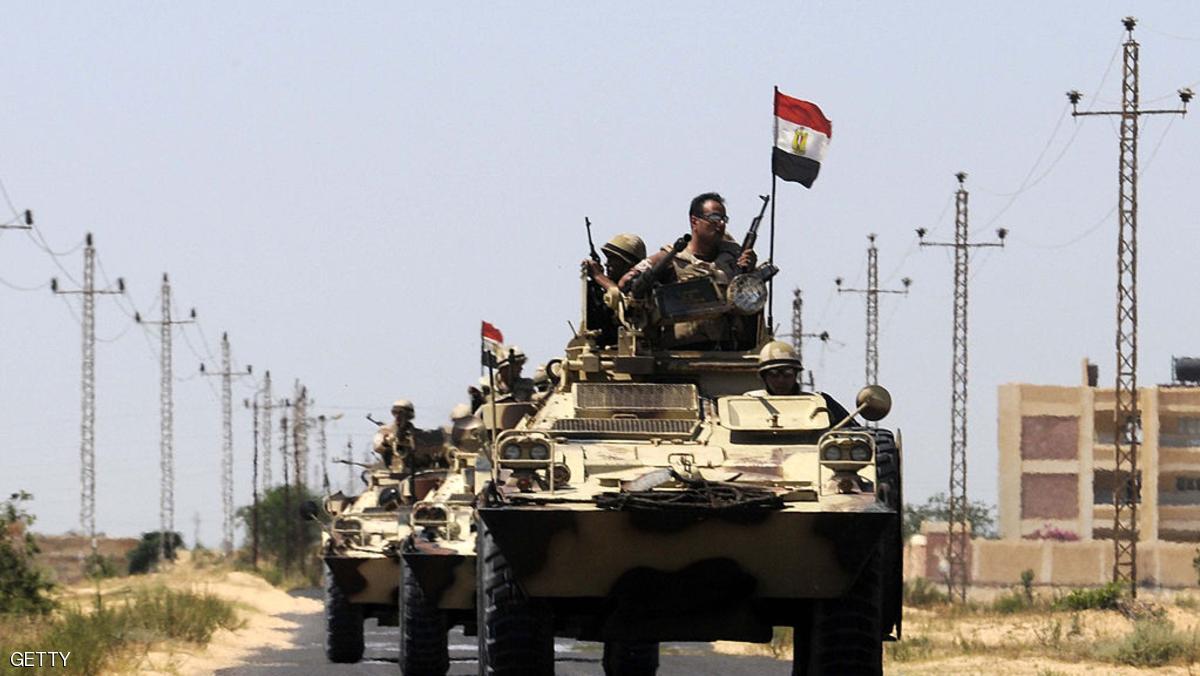 Egyptian soldiers are deployed in the area of the Rafah Crossing border between Egypt and the Gaza Strip on May 21, 2013 as Egypt intensified efforts to secure the release of seven security personnel captured in the Sinai. Tensions remained high in the peninsula after two attacks by gunmen on or near police camps, and the kidnap last week of three policemen and four soldiers. AFP PHOTO / STR (Photo credit should read STR/AFP/Getty Images)