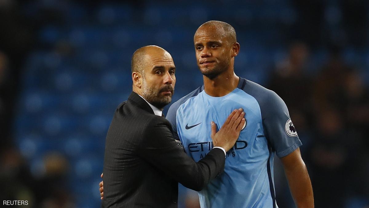Britain Soccer Football - Manchester City v Manchester United - Premier League - Etihad Stadium - 27/4/17 Manchester City's Vincent Kompany with manager Pep Guardiola at the end of the match Action Images via Reuters / Jason Cairnduff Livepic EDITORIAL USE ONLY. No use with unauthorized audio, video, data, fixture lists, club/league logos or "live" services. Online in-match use limited to 45 images, no video emulation. No use in betting, games or single club/league/player publications. Please contact your account representative for further details.