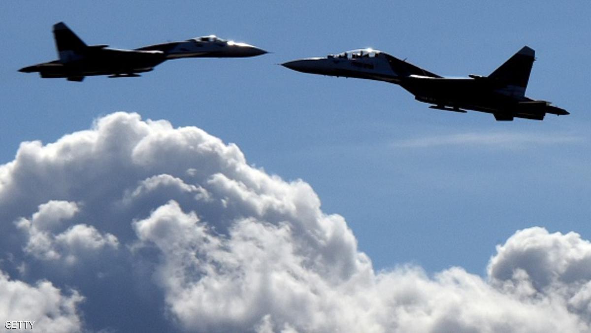 Russian Sukhoi Su-27 jet fighters perform during an air show in St. Petersburg on April 25, 2015. AFP PHOTO / OLGA MALTSEVA (Photo credit should read OLGA MALTSEVA/AFP/Getty Images)