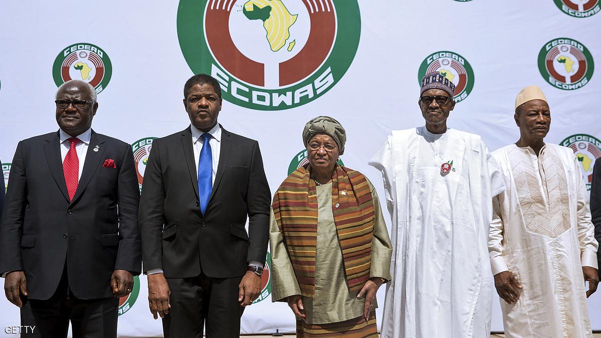 (From L) Sierra Leon's President Ernest Bai Koroma, President of ECOWAS official Marcel Alain de Souza, Liberian President and Ecowas Chairperson Ellen Johnson Sirleaf, Nigerian President Muhammadu Buhari (R) and Guinean President Alpha Conde (C) pose during the 50th summit of the 15-member Economic Community of West African States (ECOWAS) in Abuja, on December 17, 2016.
West African leaders called today for a swift resolution of the political impasse in The Gambia after disputed elections in which long-term president Yahya Jammeh is refusing to concede defeat. The appeal came at the 50th summit of the 15-member Economic Community of West African States (ECOWAS) in Nigeria, attended by 11 heads of state but without the leaders of four members including The Gambia. / AFP / Pius Utomi EKPEI (Photo credit should read PIUS UTOMI EKPEI/AFP/Getty Images)