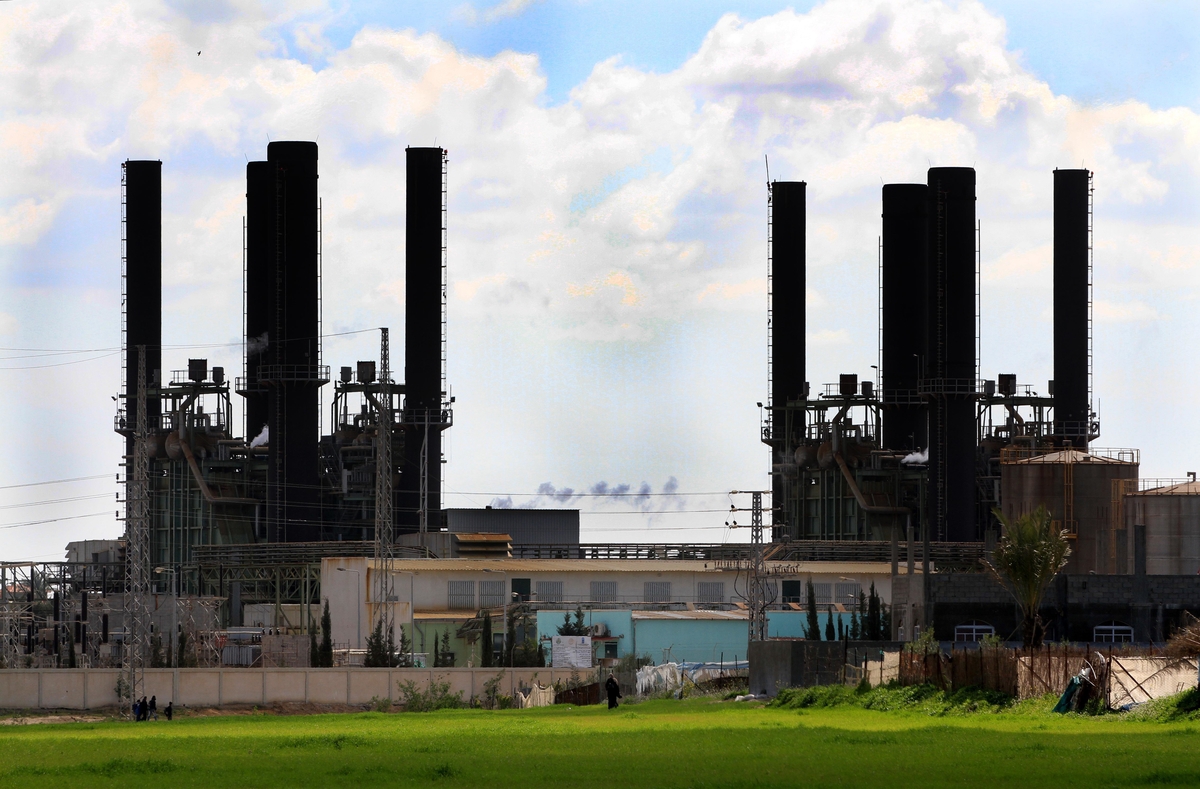 the power plant that generates electricity in Al-Nusirat in the central Gaza Strip, on 11 February 2012. The Gaza Energy Authority announced on 09 February that if fuel doesn't enter the coastal enclave within 72 hours the Strip will face a severe electricity crisis. The Palestinian government in Gaza has warned that fuel supplies for the main power plant are running out. A call for aid has been made to Arab and Muslim countries for urgent intervention and assistance. Photo by Majdi Fathi