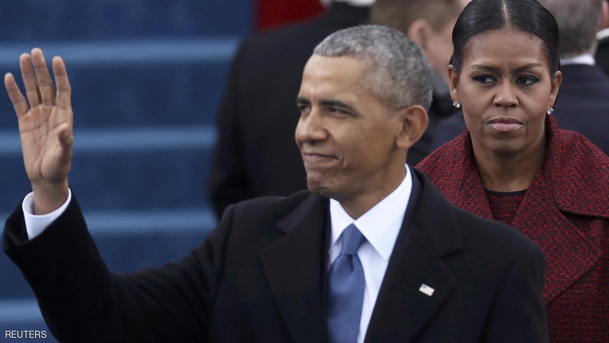 President Barack Obama and First Lady Michelle Obama (R) look on at inauguration ceremonies swearing in Donald Trump as the 45th president of the United States on the West front of the U.S. Capitol in Washington, U.S., January 20, 2017. REUTERS/Carlos Barria