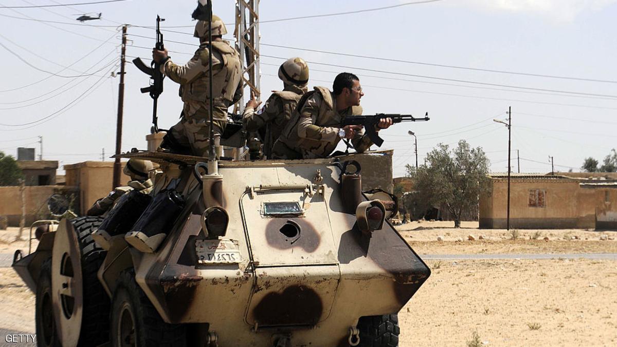 Egyptian soldiers are deployed in the area of the Rafah Crossing border between Egypt and the Gaza Strip on May 21, 2013 as Egypt intensified efforts to secure the release of seven security personnel captured in the Sinai. Tensions remained high in the peninsula after two attacks by gunmen on or near police camps, and the kidnap last week of three policemen and four soldiers. AFP PHOTO / STR (Photo credit should read STR/AFP/Getty Images)