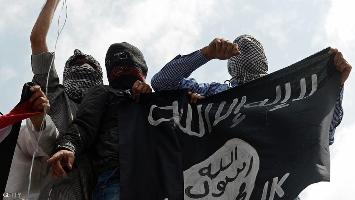 Kashmiri demonstrators hold up a flag of the Islamic State of Iraq and the Levant (ISIL) during a demonstration against Israeli military operations in Gaza, in downtown Srinagar on July 18, 2014. The death toll in Gaza hit 265 as Israel pressed a ground offensive on the 11th day of an assault aimed at stamping out rocket fire, medics said. AFP PHOTO/Tauseef MUSTAFA (Photo credit should read TAUSEEF MUSTAFA/AFP/Getty Images)