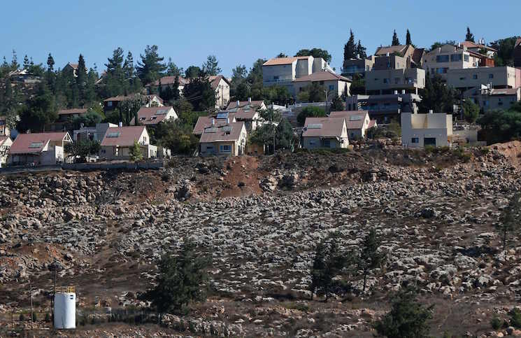 A picture taken on October 2, 2016 shows a general view of an Israeli building site of new housing units in the Jewish settlement of Shilo in the occupied Palestinian West Bank.
Israel has approved the construction of 98 settler homes in the occupied West Bank and an industrial zone near Palestinian political capital Ramallah, the watchdog Peace Now said on October 2, 2016. / AFP PHOTO / AHMAD GHARABLI