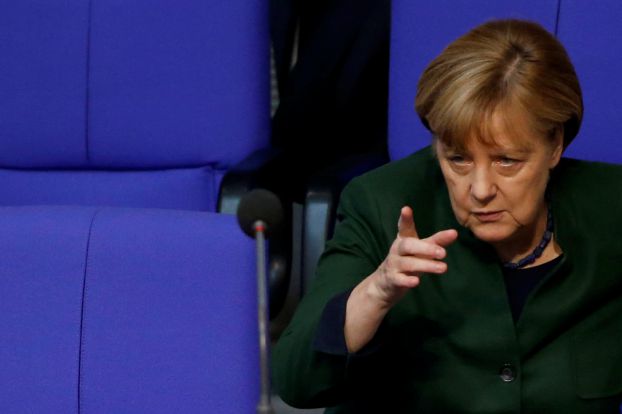 German Chancellor Angela Merkel attends a meeting at the lower house of parliament Bundestag on 2017 budget in Berlin, Germany, November 23, 2016. REUTERS/Fabrizio Bensch/File Photo