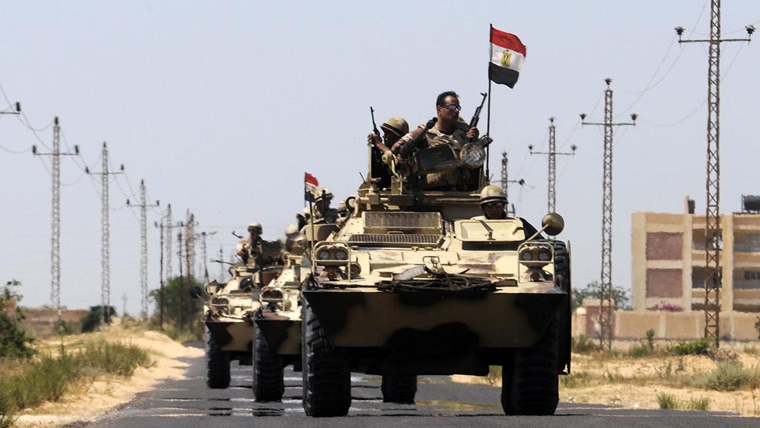 Egyptian soldiers are deployed in the area of the Rafah Crossing border between Egypt and the Gaza Strip on May 21, 2013 as Egypt intensified efforts to secure the release of seven security personnel captured in the Sinai. Tensions remained high in the peninsula after two attacks by gunmen on or near police camps, and the kidnap last week of three policemen and four soldiers. AFP PHOTO / STR (Photo credit should read STR/AFP/Getty Images)