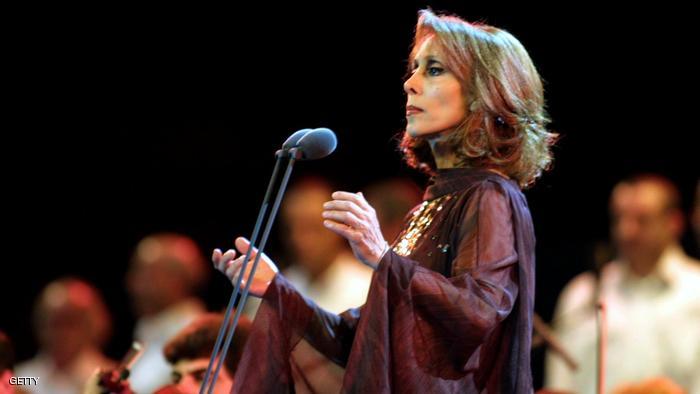 Lebanese diva Fairuz performs at the annual festival of Beiteddine in the Chouf region 31 July 2001. Fairuz gave three concerts at the festival, accompanied by her son Ziad and conductor Karen Durgaryan. (Photo credit should read RAMZI HAIDAR/AFP/Getty Images)