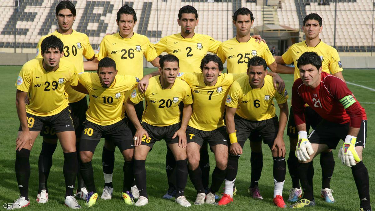 A group photo of Arbil's Club team members prior to their match against Al-Talaba Club prior to the opening match of the Iraqi League football at the Francois Hariri Stadium in Arbil on October 29, 2011. AFP PHOTO/SAFIN HAMED (Photo credit should read SAFIN HAMED/AFP/Getty Images)