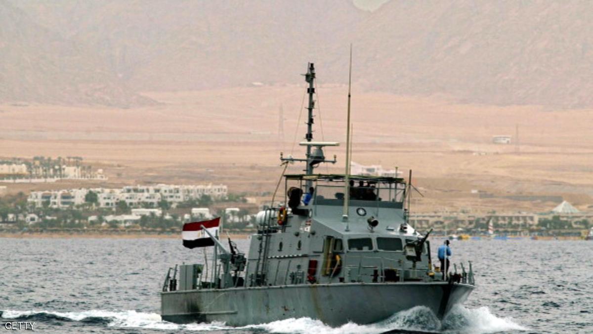 An Egyptian navy boat cruises 06 January 2003 off the coast of the red sea resort of Sharm el-Sheikh in search for the wreckage of the doomed Egyptian Flash Airlines' Boeing 737-300 aircraft that crashed in the Red Sea after taking off from the Sharm el-sheikh airport, killing all 148 people on board, including 133 French tourists. Intensive search was done today to locate the black box of the plane with French navy scanning a huge area of the sea with sonar system. Salvage teams appeared hotter on the trail to the wreck, homing in on a signal they suspect is from one of the flight recorders. AFP PHOTO/Marwan NAAMANI (Photo credit should read MARWAN NAAMANI/AFP/Getty Images)