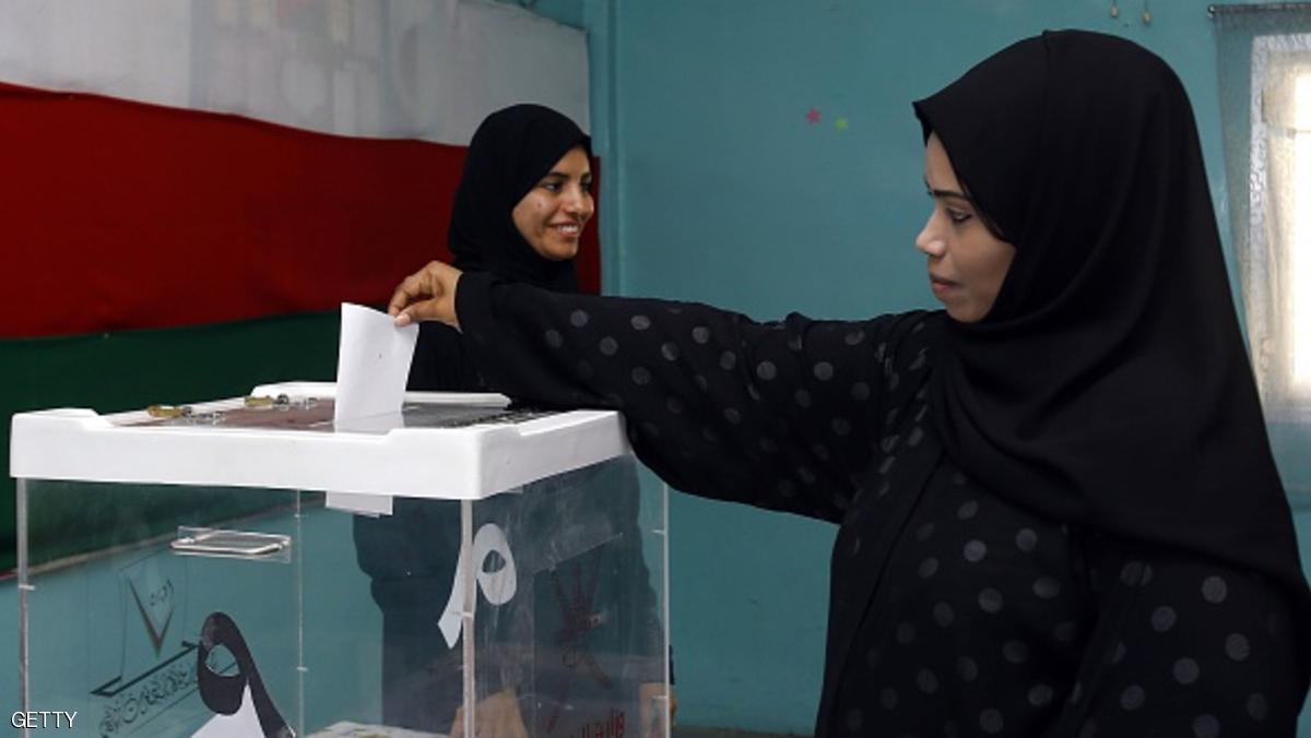 An Omani woman casts her ballot at a polling station in Muscat for a consultative council on October 25, 2015, where the longtime ruling sultan holds all major government posts. Sultan Qaboos slightly expanded the powers of the Majlis al-Shura in 2011 after unprecedented social unrest when the normally-quiet nation became caught up in protests which swept the Arab world. AFP PHOTO / MOHAMMED MAHJOUB (Photo credit should read MOHAMMED MAHJOUB/AFP/Getty Images)
