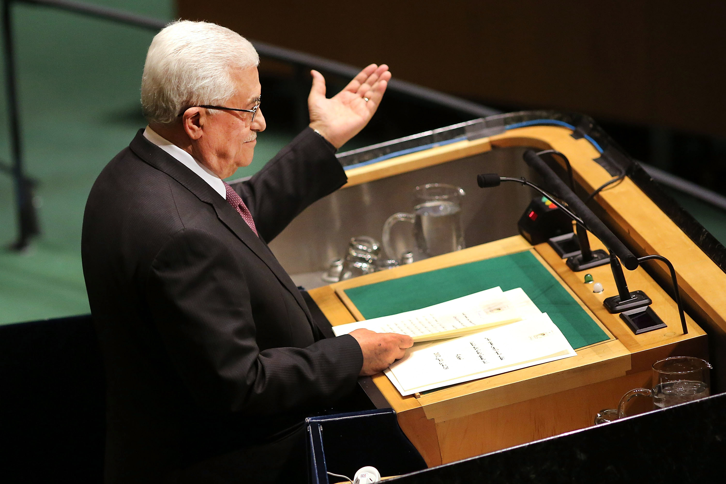NEW YORK, NY - NOVEMBER 29: Palestinian Authority President Mahmoud Abbas addresses the General Assembly at the United Nations before a UN General Assembly vote on upgrading the status of the Palestinians to non-member observer state on November 29, 2012 in New York City. With many European nations in favor, it looks certain that the Palestinians will win the coveted U.N. recognition as a state today. Spencer Platt/Getty Images/AFP== FOR NEWSPAPERS, INTERNET, TELCOS & TELEVISION USE ONLY ==