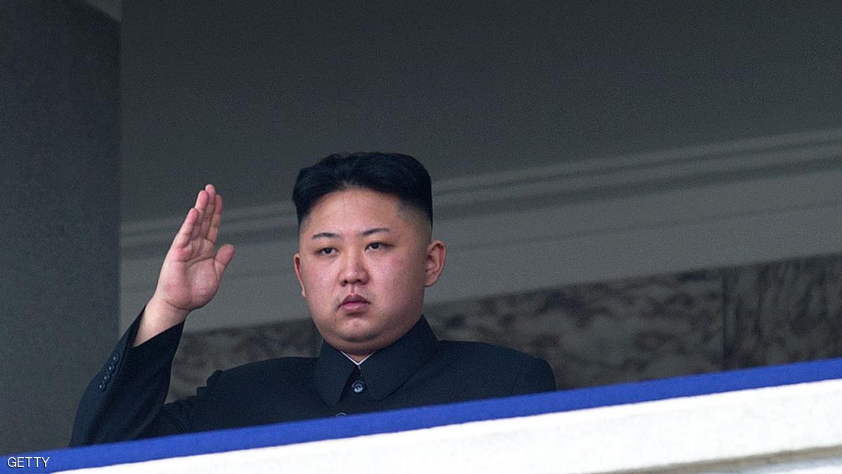 TO GO WITH Oly-2012-PRK,FEATURE
(FILES) This file photo taken on April 15, 2012 shows North Korean leader Kim Jong-Un saluting as he watches a military parade to mark 100 years since the birth of the country's founder and his grandfather, Kim Il-Sung, in Pyongyang. He lacks the toned physique of an Olympian but "dear respected" leader Kim Jong-Un will be the inspiration when North Korea's athletes go for gold at the London Olympics. North Korea are aiming for a record number of medals in London in what would be a timely boost for Kim, the new face of the country's ruling dynasty and its all-pervasive personality cult. AFP PHOTO / FILES / Ed Jones (Photo credit should read Ed Jones/AFP/GettyImages)