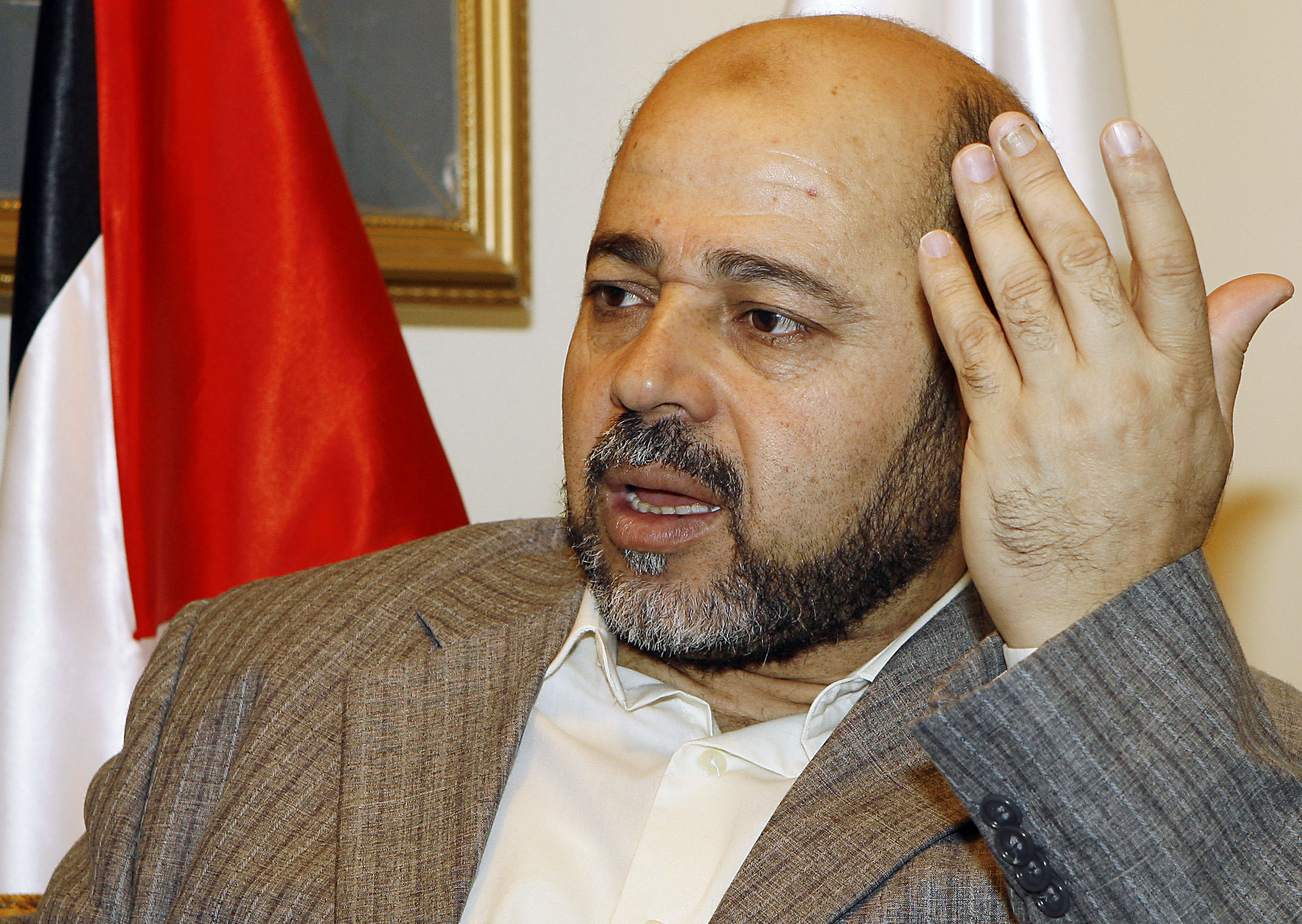 Deputy Hamas leader Moussa Abu Marzouk speaks during an interview with The Associated Press in Damascus, Syria, Saturday, Nov. 08, 2008. Abu Marzouk on Saturday announced that his group would boycott this weekend's Palestinian reconciliation talks with rival Fatah. Abu Marzouk told The Associated Press that Fatah had reneged on a pledge to release Hamas prisoners it holds ahead of the dialogue, prompting the boycott. He acknowledged that many issues had been settled but that the prisoners issue was too important to disregard. (AP Photo/Bassem Tellawi)