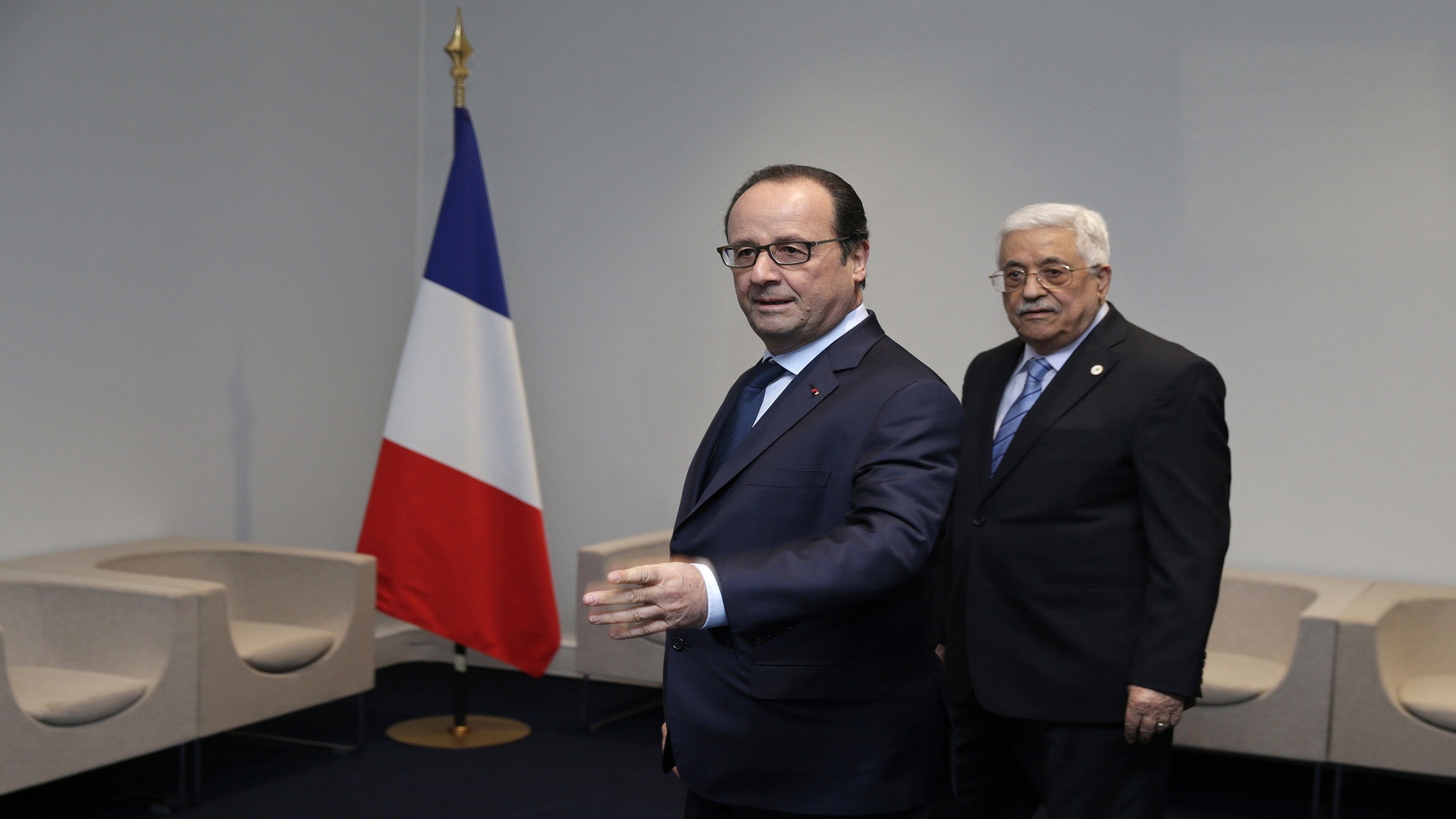 French President Francois Hollande (L) and Palestinian President Mahmoud Abbas arrive for a bilateral meeting during the opening day of the World Climate Change Conference 2015 (COP21) at Le Bourget, near Paris, on November 30, 2015. More than 150 world leaders are meeting under heightened security, for the 21st Session of the Conference of the Parties to the United Nations Framework Convention on Climate Change (COP21/CMP11), also known as Paris 2015 from November 30 to December 11. AFP PHOTO / POOL / PHILIPPE WOJAZER / AFP / POOL / PHILIPPE WOJAZER (Photo credit should read PHILIPPE WOJAZER/AFP/Getty Images)