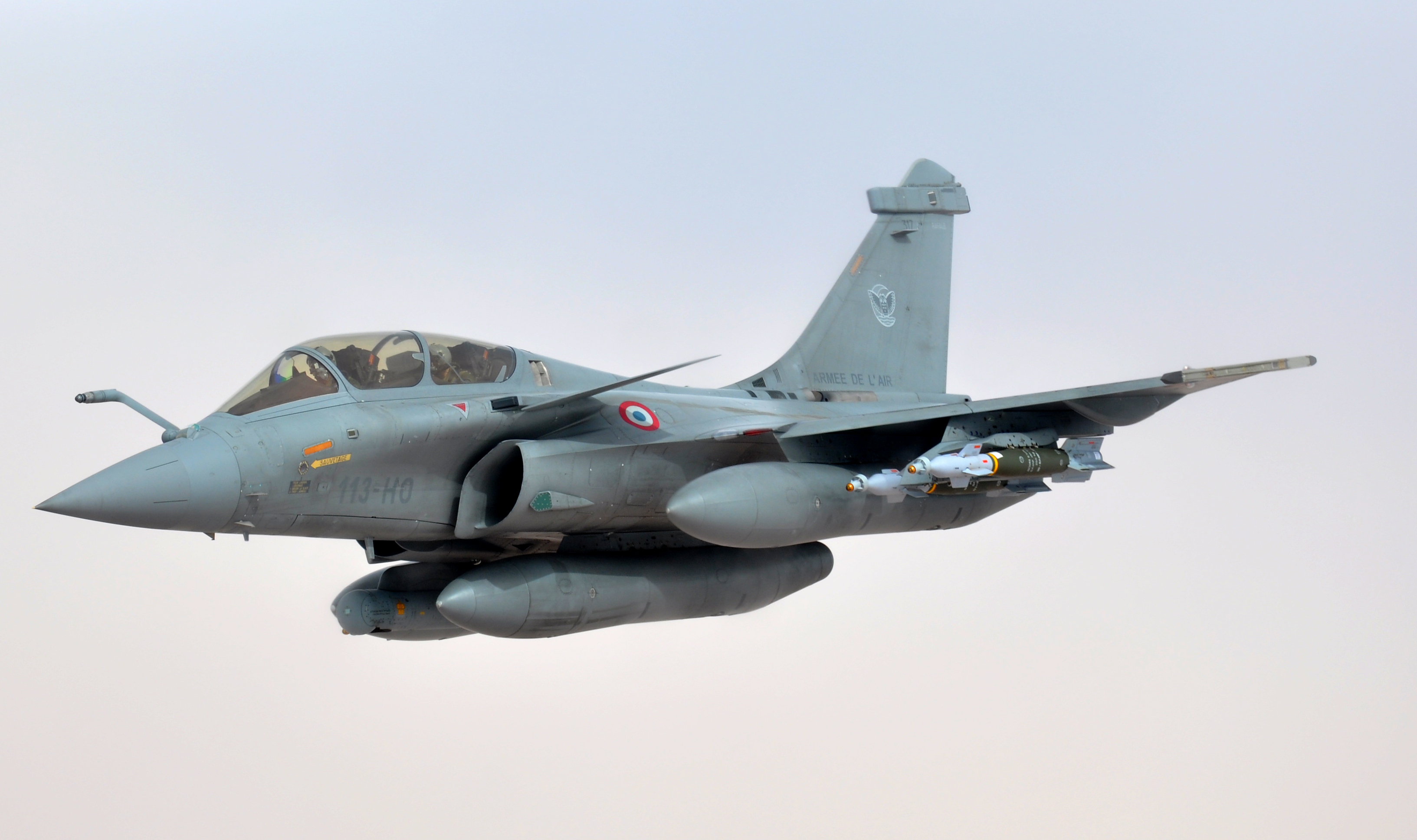 A French fighter aircraft backs away after refueling from a KC-135 Stratotanker March 17, 2013, over Africa. The 351st Expeditionary Air Refueling Squadron, which flies the tankers, completed the 100th refueling mission of French fighter aircraft conducting operations over Mali. Airmen and aircraft from the 100th Air Refueling Wing, RAF Mildenhall, England, deployed as the 351st EARS to a location in southwest Europe on Jan. 26, 2013. (U.S. Air Force photo by Capt. Jason Smith)