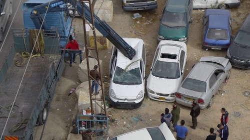 جيش الاحتلال يدمر محلات بيع السيارات المشطوبة جنوب نابلس