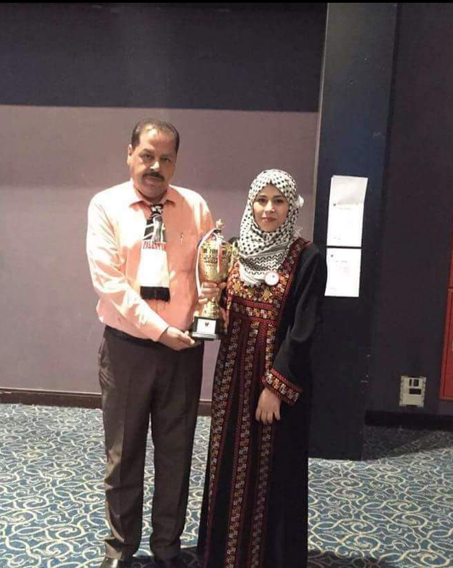 فلسطين تحصل على جائزة أفضل مدرب بالبطولة العربية للروبوت