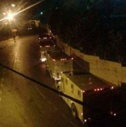 الاحتلال يعتقل 11 مواطنا ويصب شابا في قلنديا 