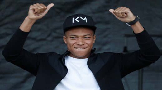 France soccer team player Kylian Mbappe reacts on stage at the Leo Lagrange stadium in Bondy near Paris, France, to mark France's victory in the 2018 Russia Soccer World Cup, October 17, 2018. REUTERS/Benoit Tessier