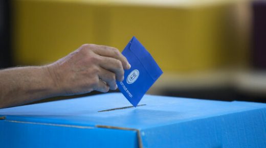 An Israeli man casts his vote during Israel's general elections in Tel Aviv, Israel, Tuesday, April 9, 2019. (AP Photo/Sebastian Scheiner)