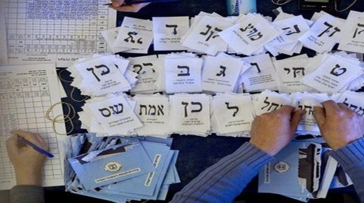 Israeli election workers count remaining ballots from soldiers and absentees at the Knesset in Jerusalem, Thursday, Feb. 12, 2009. Israeli President Shimon Peres will consult all 12 parties in the new parliament next week, and based on their preferences, he will pick either Likud party leader Benjamin Netanyahu or Kadima party leader and Foreign Minister Tzipi Livni to try to form a government. Final results of the elections are set to be released on Thursday. (AP Photo/Sebastian Scheiner)