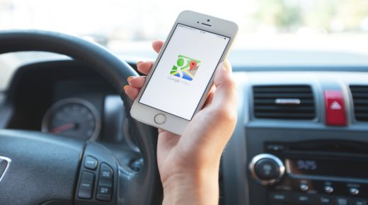 Kharkiv, Ukraine - August 2, 2014: Google Maps Navigation software in use on an Apple iPhone 5s. iPhone is product Apple Inc. Google Maps is a most popular web mapping service application and technology provided by Google inc.