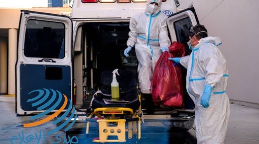 FILE PHOTO: EMTs cleanse their materials outside Memorial West Hospital where coronavirus disease (COVID-19) patients are treated, in Pembroke Pines, Florida, U.S. July 13, 2020. REUTERS/Maria Alejandra Cardona/File Photo