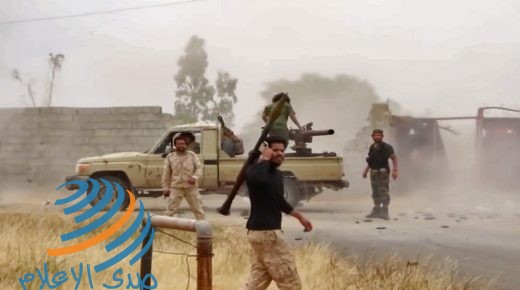 This image grab taken from a video published on the Facebook page of the War Information Division of military strongman Khalifa Haftar's self-proclaimed Libyan National Army (LNA) on May 26, 2019 shows fighters loyal to Haftar reportedly advancing on a road south of the capital Tripoli. (Photo by - / various sources / AFP) / RESTRICTED TO EDITORIAL USE - MANDATORY CREDIT "AFP PHOTO / LNA WAR INFORMATION DIVISION" - NO MARKETING NO ADVERTISING CAMPAIGNS - DISTRIBUTED AS A SERVICE TO CLIENTS