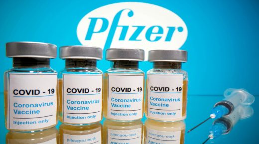 FILE PHOTO: FILE PHOTO: FILE PHOTO: FILE PHOTO: FILE PHOTO: Vials with a sticker reading, "COVID-19 / Coronavirus vaccine / Injection only" and a medical syringe are seen in front of a displayed Pfizer logo in this illustration taken October 31, 2020. REUTERS/Dado Ruvic/Illustration/File Photo/File Photo