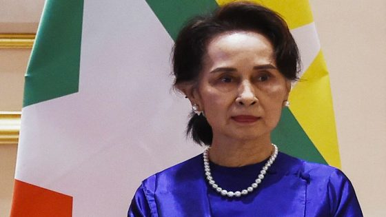 (FILES) in this file photo taken on January 17, 2020, Myanmar's State Counsellor Aung San Suu Kyi poses for pictures during a welcoming ceremony for China's President Xi Jinping at the Presidential Palace in Naypyidaw. Myanmar junta court jails Suu Kyi for six years on August 15, 2022, for corruption. (Photo by AFP)