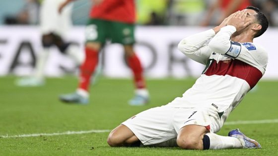 Portugal's forward #07 Cristiano Ronaldo reacts during the Qatar 2022 World Cup quarter-final football match between Morocco and Portugal at the Al-Thumama Stadium in Doha on December 10, 2022. (Photo by PATRICIA DE MELO MOREIRA / AFP)