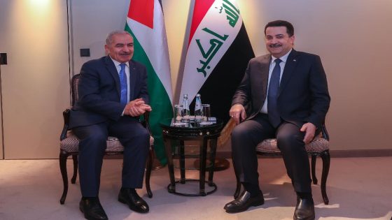 رئيس الوزراء محمد اشتية خلال لقاء نظيره العراقي السوادني