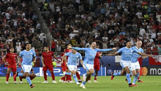 Manchester City's players celebrate victory after the penalty shootout of the 2023 UEFA Super Cup football match between Manchester City and Sevilla at the Georgios Karaiskakis Stadium in Piraeus on August 16, 2023. (Photo by Aris MESSINIS / AFP)