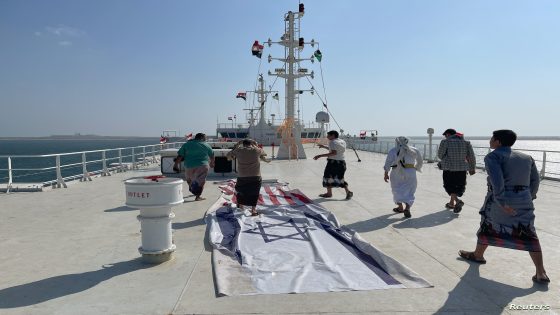 People tour the deck of the Galaxy Leader commercial ship, seized by Yemen's Houthis last month, off the coast of al-Salif, Yemen December 5, 2023. REUTERS/Khaled Abdullah