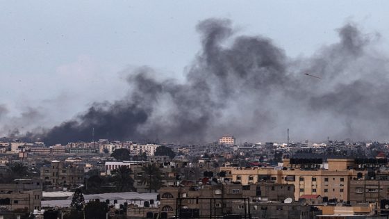 This picture taken from Rafah shows smoke billowing following Israeli bombardment over Khan Yunis in the southern Gaza Strip on February 15, 2024, amid the ongoing conflict between Israel and the Palestinian Hamas militant group. (Photo by SAID KHATIB / AFP)
