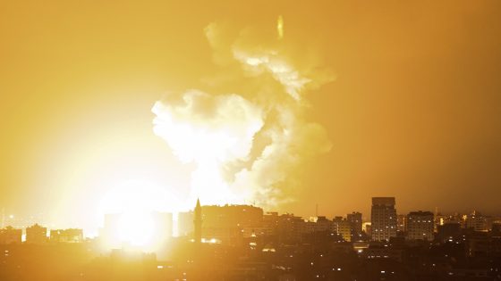 Smoke rises above buildings in Gaza City on the Palestinian enclave on May 2, 2023. - The Israeli military traded fire with Gaza militants on May 2, 2023 in a flare-up of violence following the death in Israeli custody of a Palestinian prisoner on hunger strike. (Photo by MOHAMMED ABED / AFP)