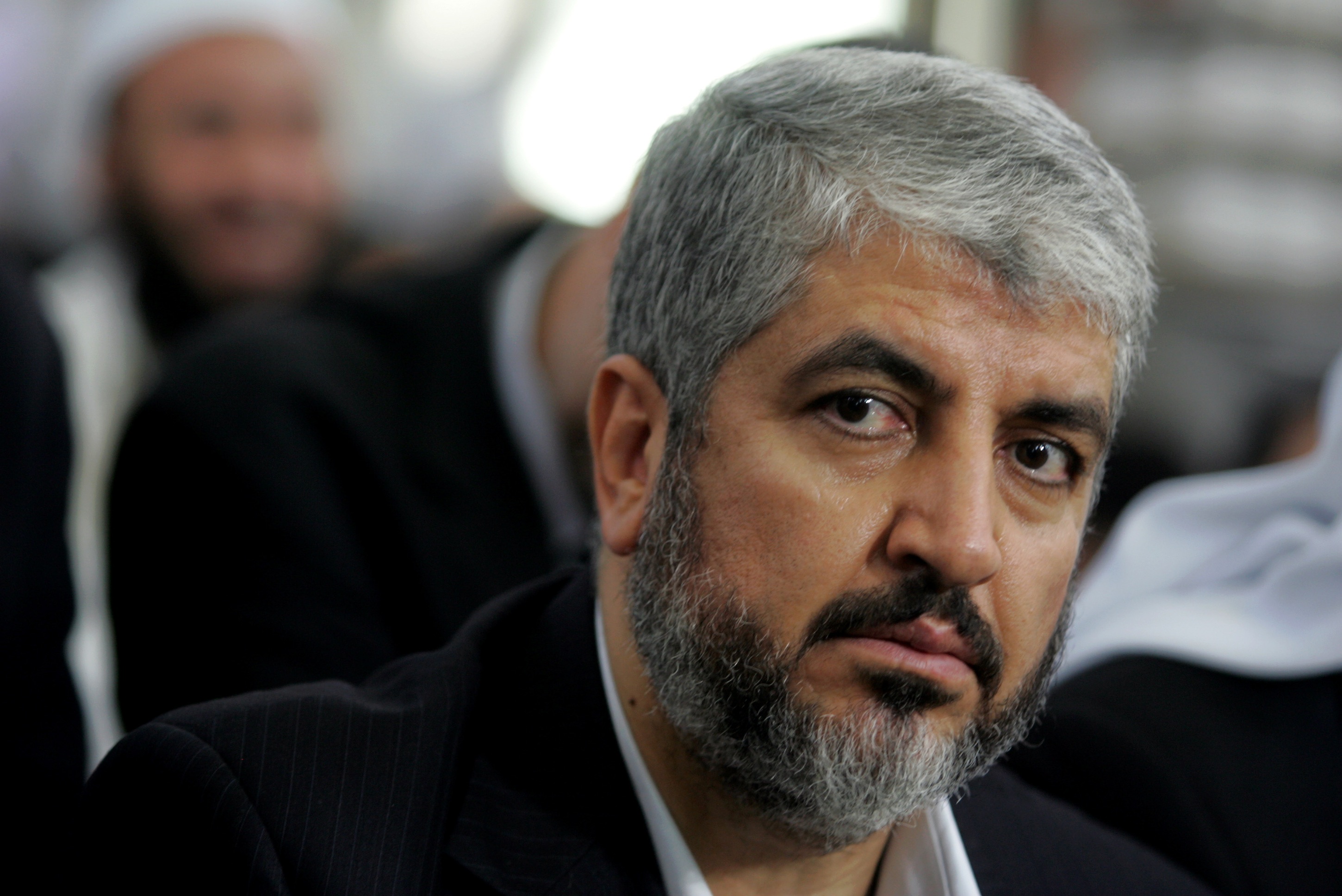 FILE - In this this Aug. 29, 2009 file photo, Khaled Mashaal, Hamas leader, center, attends his father's funeral at a Mosque in Amman, Jordan. Senior Hamas figures gathered for the last stage of internal elections on Monday in Cairo, where two officials in the Islamic militant movement said a new leader may be announced later in the day. Qatar-based Mashaal, who has run the Palestinian movement since 1996, is seen as the front-runner. Mashaal, 56, is backed by regional powers Qatar, Turkey and Egypt. (AP Photo/Nader Daoud, File)