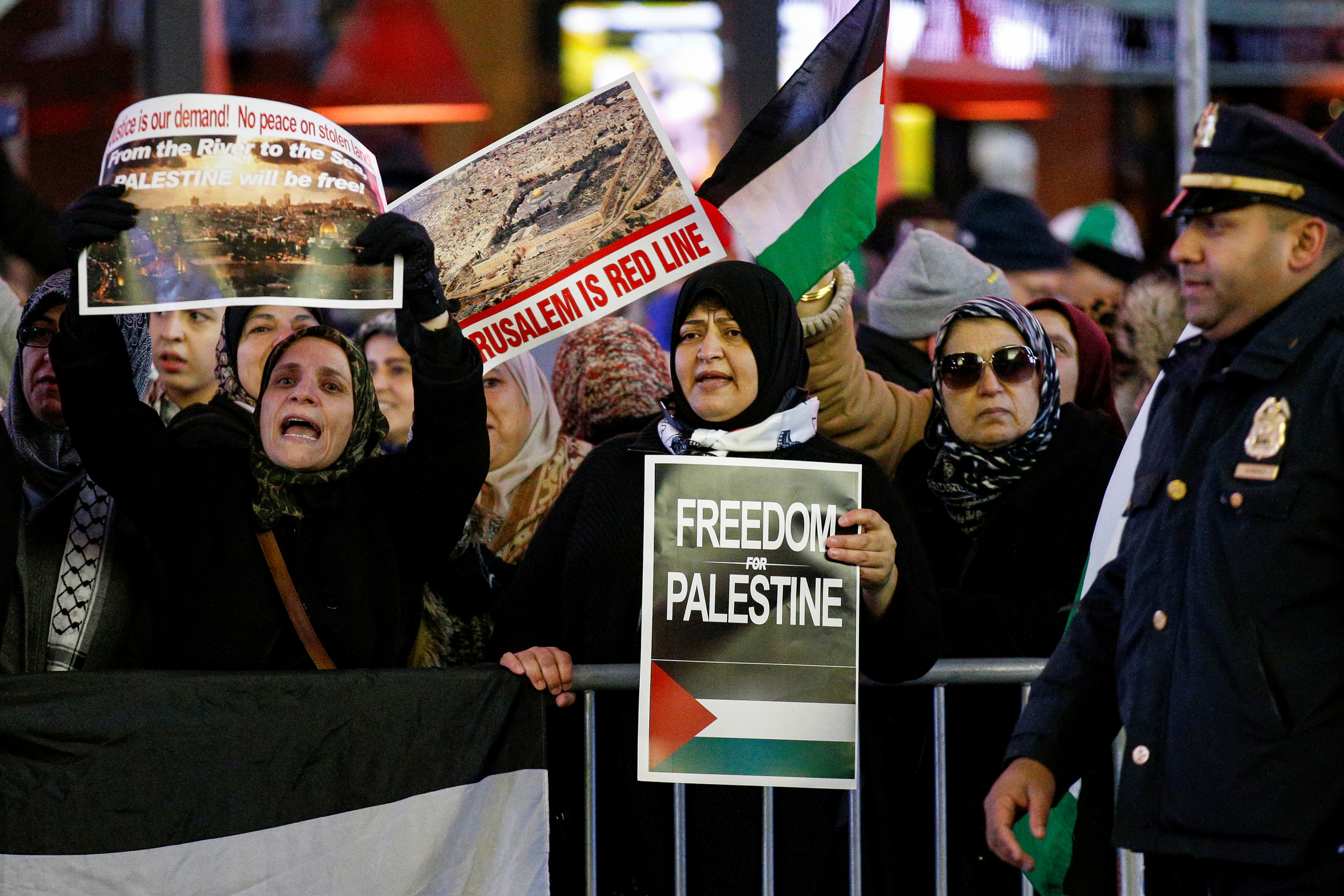 Pro-Palestinian demonstrators gather in Times Square against in New York City, U.S., December 8, 2017. REUTERS/Brendan McDermid