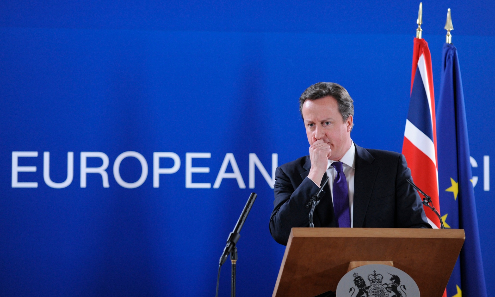 British Prime Minister David Cameron speaks at a press conference at the EU Headquarters on February 8, 2013 in Brussels, on the last day of a two-day European Union leaders summit. After 24 hours of talks lasting through the night, European Union leaders finally clinched a deal on the bloc's next 2014-2020 budget, summit chair and EU president Herman Van Rompuy said Friday. AFP PHOTO / JOHN THYS (Photo credit should read JOHN THYS/AFP/Getty Images)