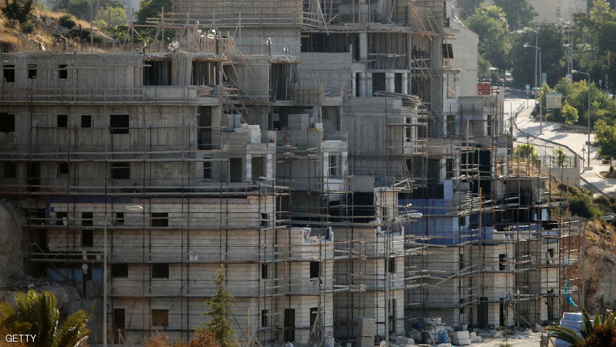 A picture taken from the West Bank city of Hebron on July 6, 2016 shows buildings under construction in the Kiryat Arba Jewish settlement on the outskirts of the Palestinian flashpoint city. / AFP / HAZEM BADER (Photo credit should read HAZEM BADER/AFP/Getty Images)