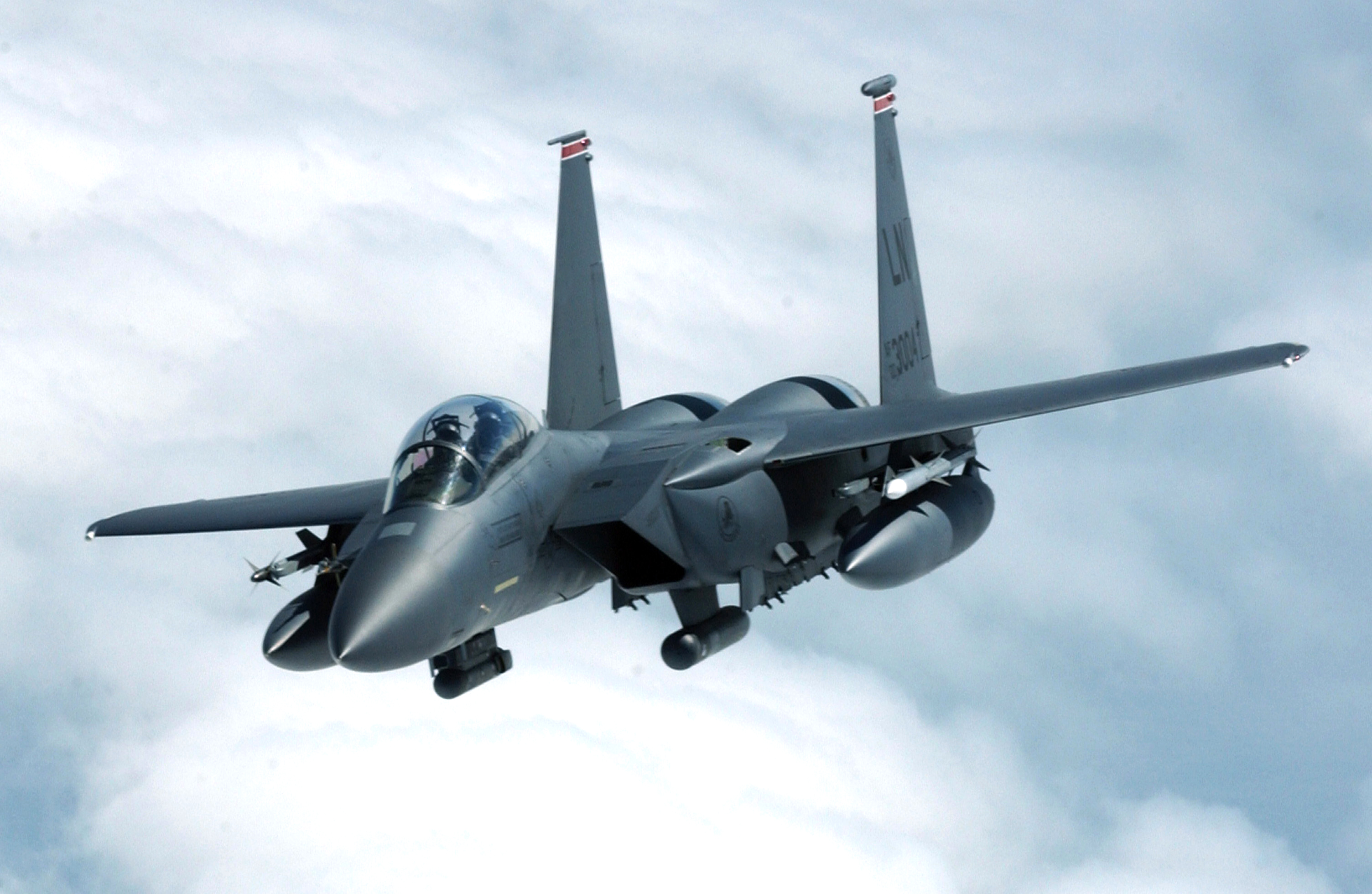 OVER THE NORTH SEA -- An F-15E Strike Eagle from the 494th Fighter Squadron, Royal Air Force Lakenheath, United Kingdom, banks away after receiving fuel during a training mission here July 19. The F-15E Strike Eagle is considered the most advanced two-seat tactical aircraft in the world. The "E's" radar system allows aircrews to pick out bridges and airfields on the radar display from distances more than 80 miles away. (U.S. Air Force photo by Staff Sgt. Tony R. Tolley)