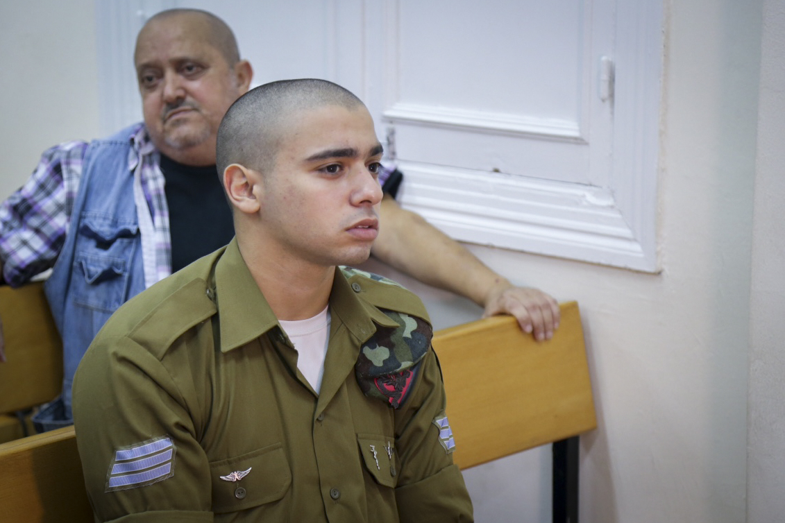 Elior Azaria, the Israeli soldier, who shot a Palestinian terrorist in Hebron seen at a court hearing at a military court in Jaffa, July 11, 2016. Elior Azaria was filmed shooting a Palestinian attacker, who was already "neutralized" by other soldiers who stopped him from attacking further. Photo by Flash90 *** Local Caption *** טרור
פיגוע
דקירה
פצוע קל
אליאור עזריה
מחבל
חיילים
חברון
כתב אישום
משפחה
חייל יורה
מואשם
בצלם
בית משפט
יפו