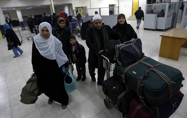 Palestinians return to the Gaza Strip from the Rafah border terminal between Egypt and the coastal strip on February 18, 2011. Egypt reopened its Rafah border crossing to Gaza, shut since anti-regime protests erupted on January 25, but only to allow Palestinians to enter the enclave. AFP PHOTO/ SAID KHATIB (Photo credit should read SAID KHATIB/AFP/Getty Images)